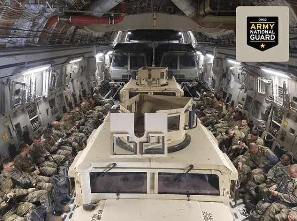 Ohio Army National Guard Hummers on a plane