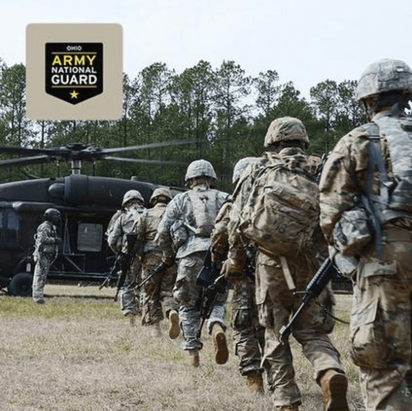 Ohio Army National Guard Servicemen gettin on Blackhawk